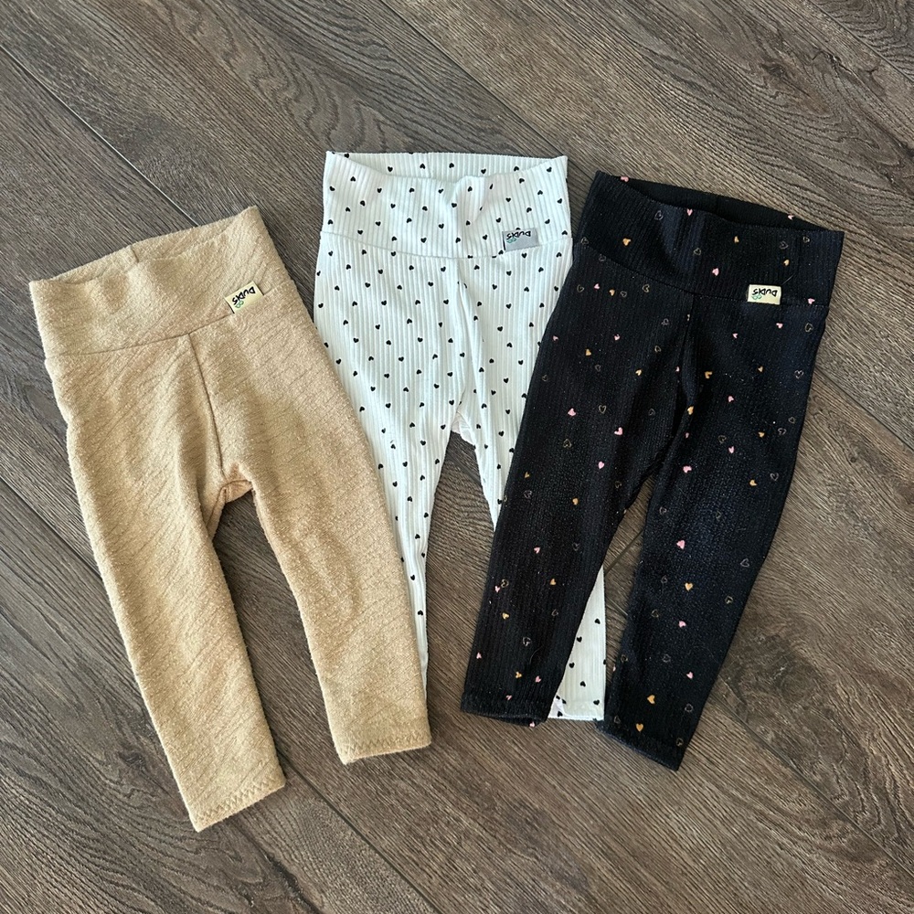 Three pairs 6-9 month Dudi's Design leggings